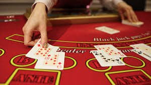 Mobile app interface showing live blackjack table with betting controls